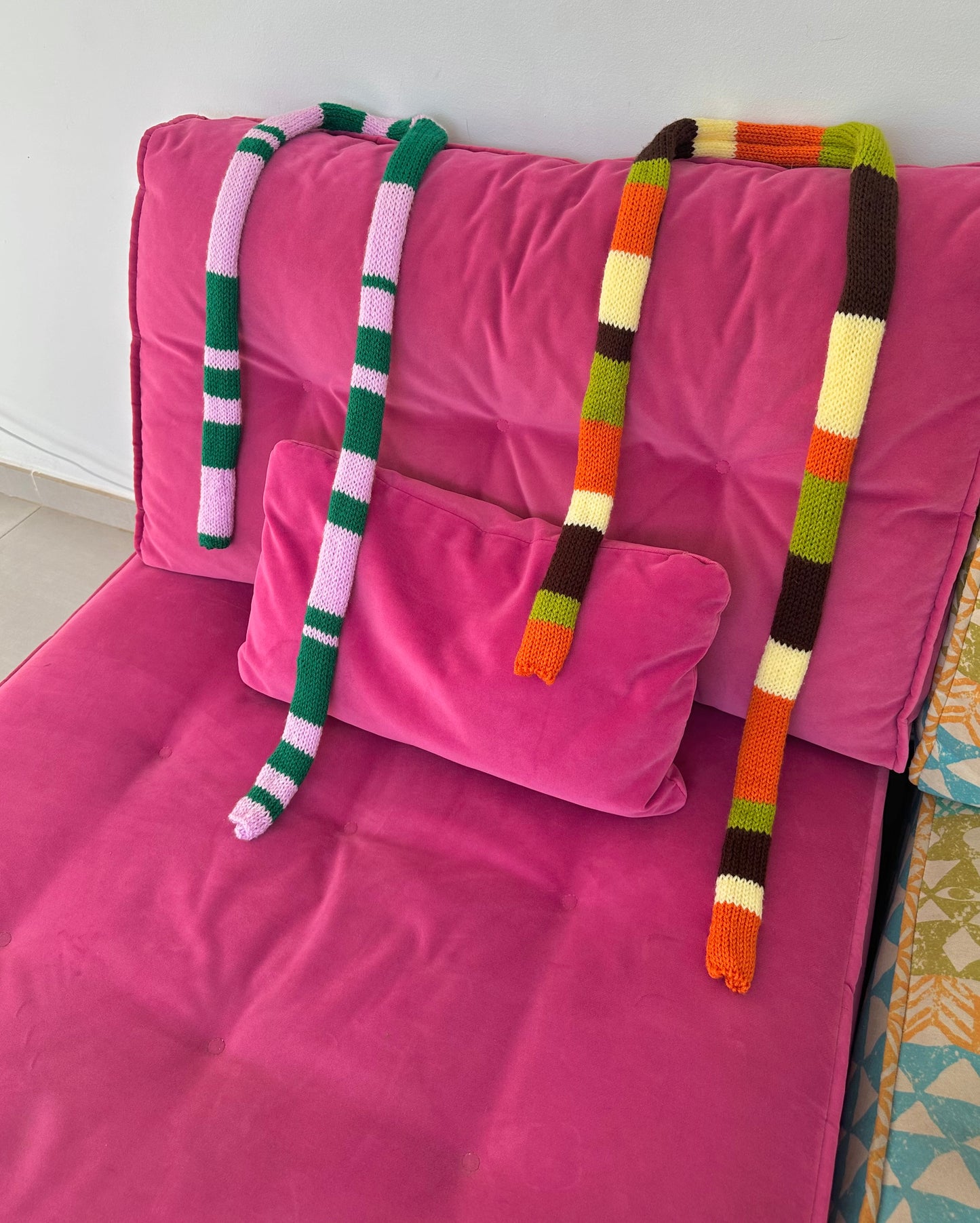 Handmade knitted stripy skinny scarf in baby pink and green