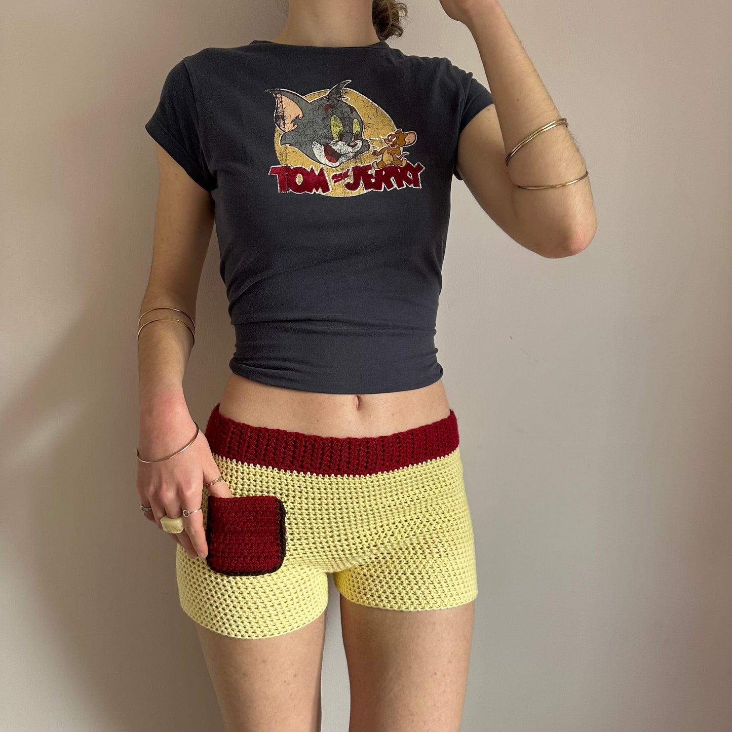Handmade crochet shorts in pastel yellow, dark red and brown with pocket