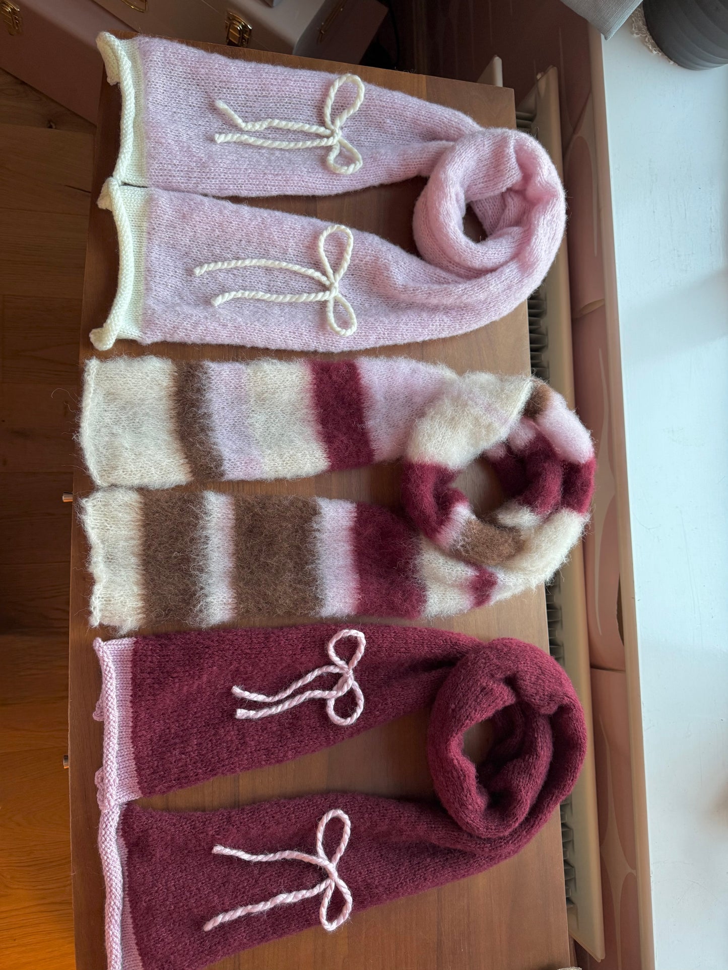 Handmade knitted baby pink and cream mohair bow scarf