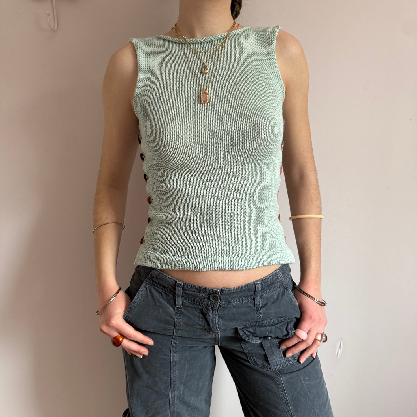 The Pearl Vest in mint green - with pink mother of pearl buttons