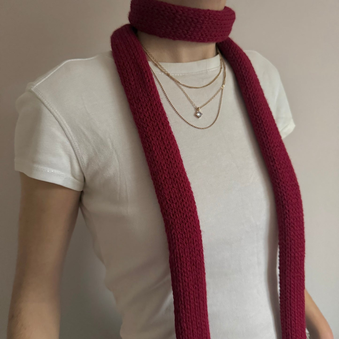 Handmade knitted skinny scarf in dark red