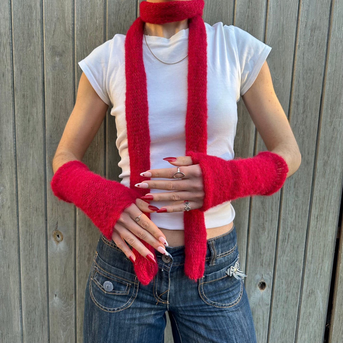 red mohair knitted scarf showing matching gloves