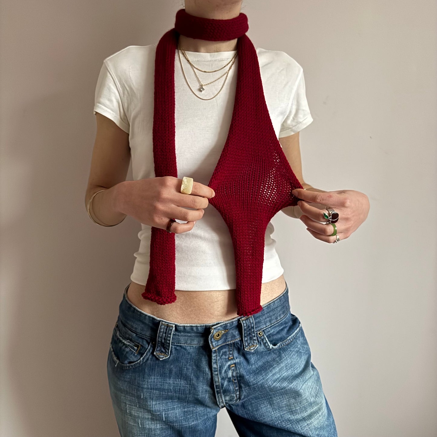 Handmade knitted skinny scarf in dark red