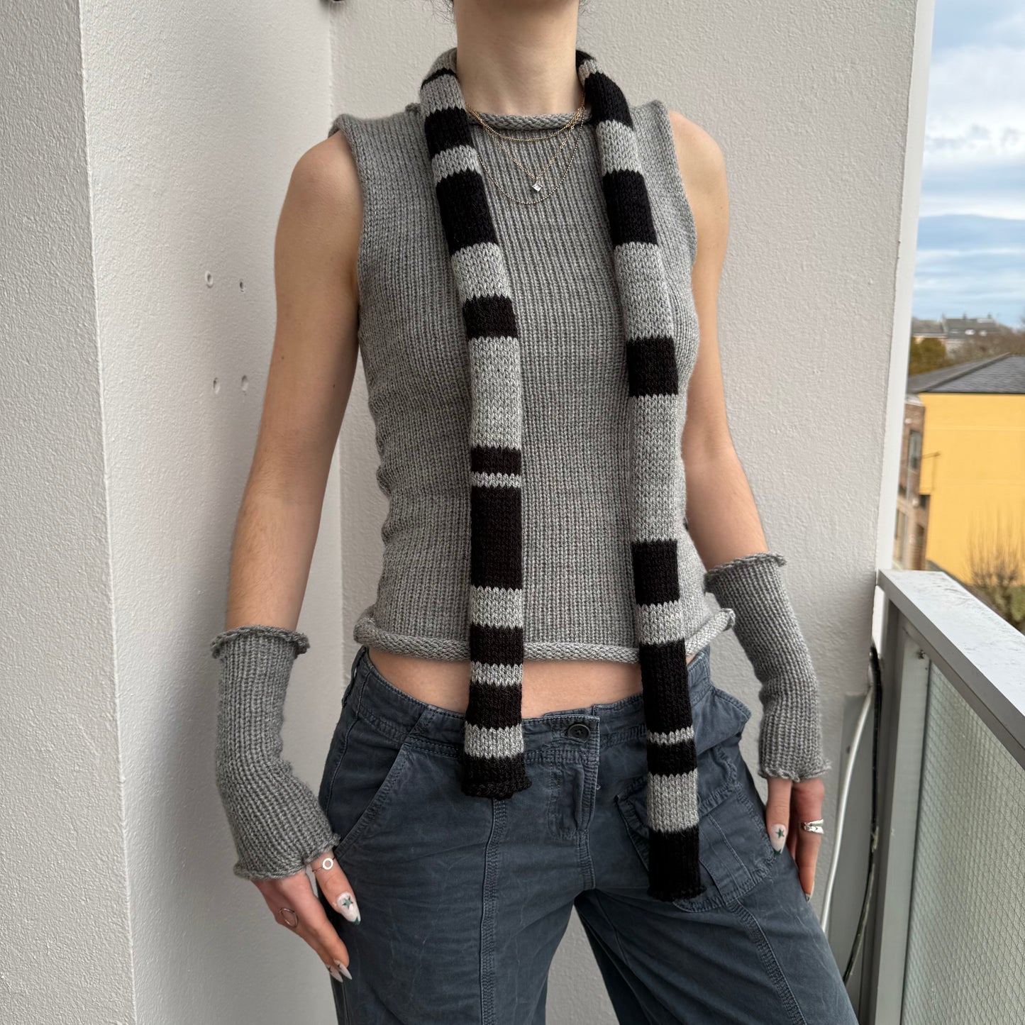 grey and black striped knitted scarf full length