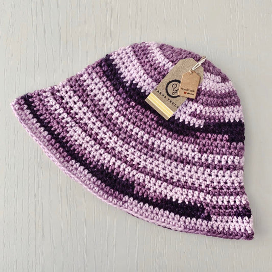Handmade striped crochet bucket hat in purple shades