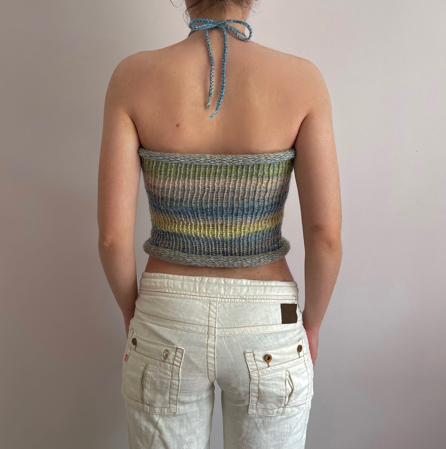 Handmade knitted halter top in green, beige, yellow and blue