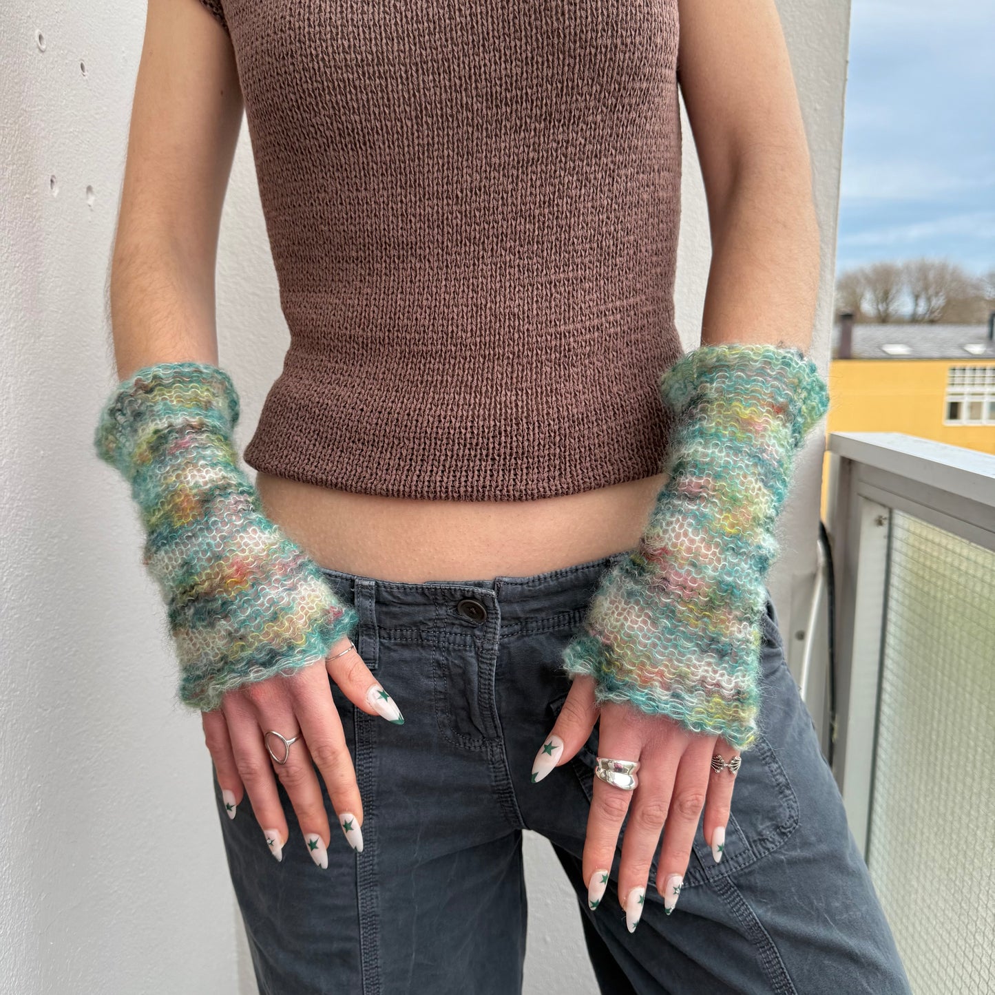 Handmade green ombré knitted mohair hand warmers