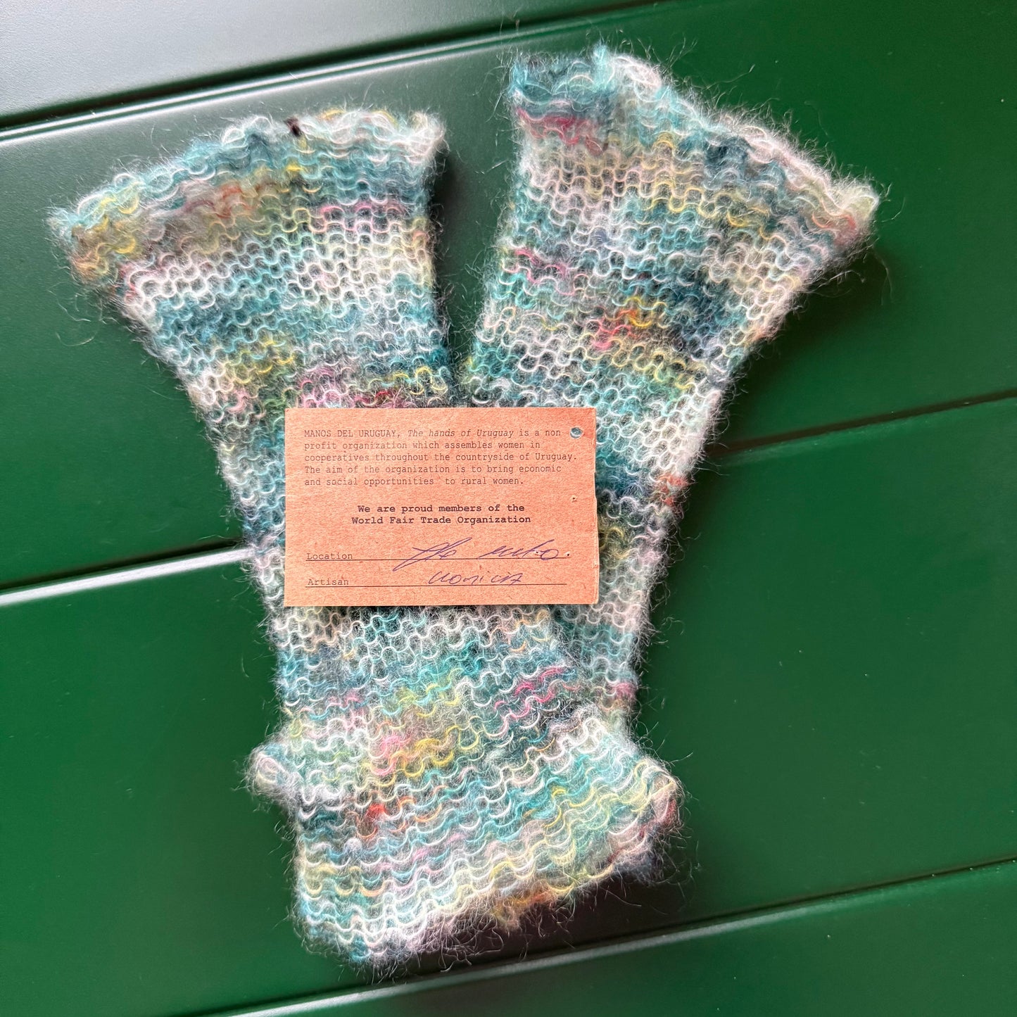 Handmade green ombré knitted mohair hand warmers