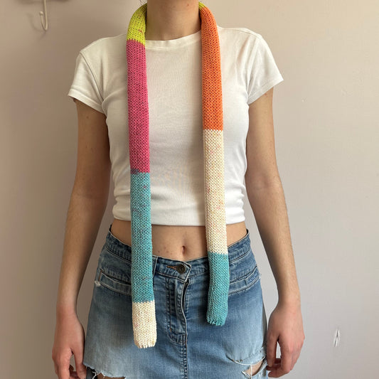 Handmade cotton knitted colour block skinny scarf in blue, cream, orange, pink and green