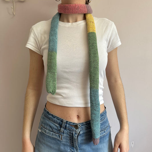 Handmade cotton knitted colour block skinny scarf in dusky rainbow