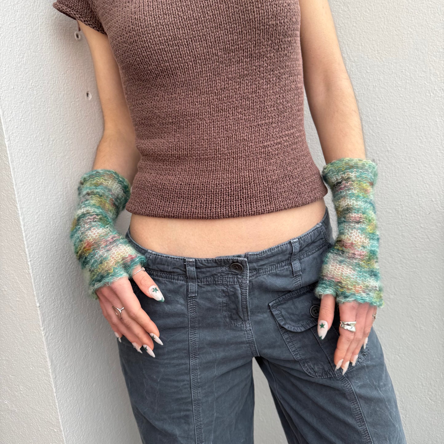Handmade green ombré knitted mohair hand warmers