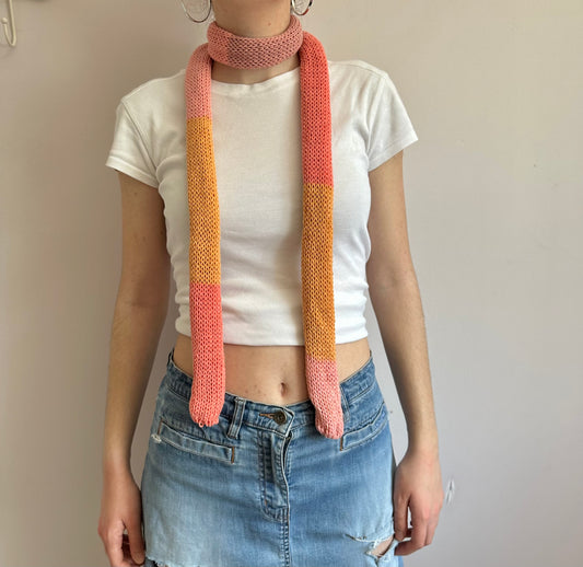 Handmade cotton knitted colour block skinny scarf in coral and orange