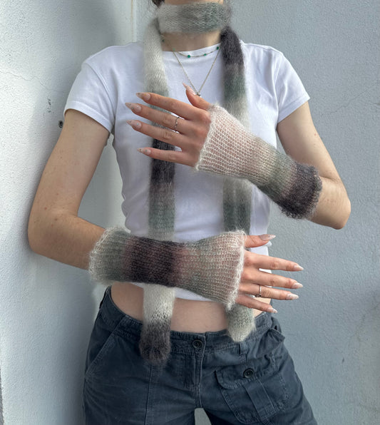 Handmade knitted mohair hand warmers in ombré black, grey and white