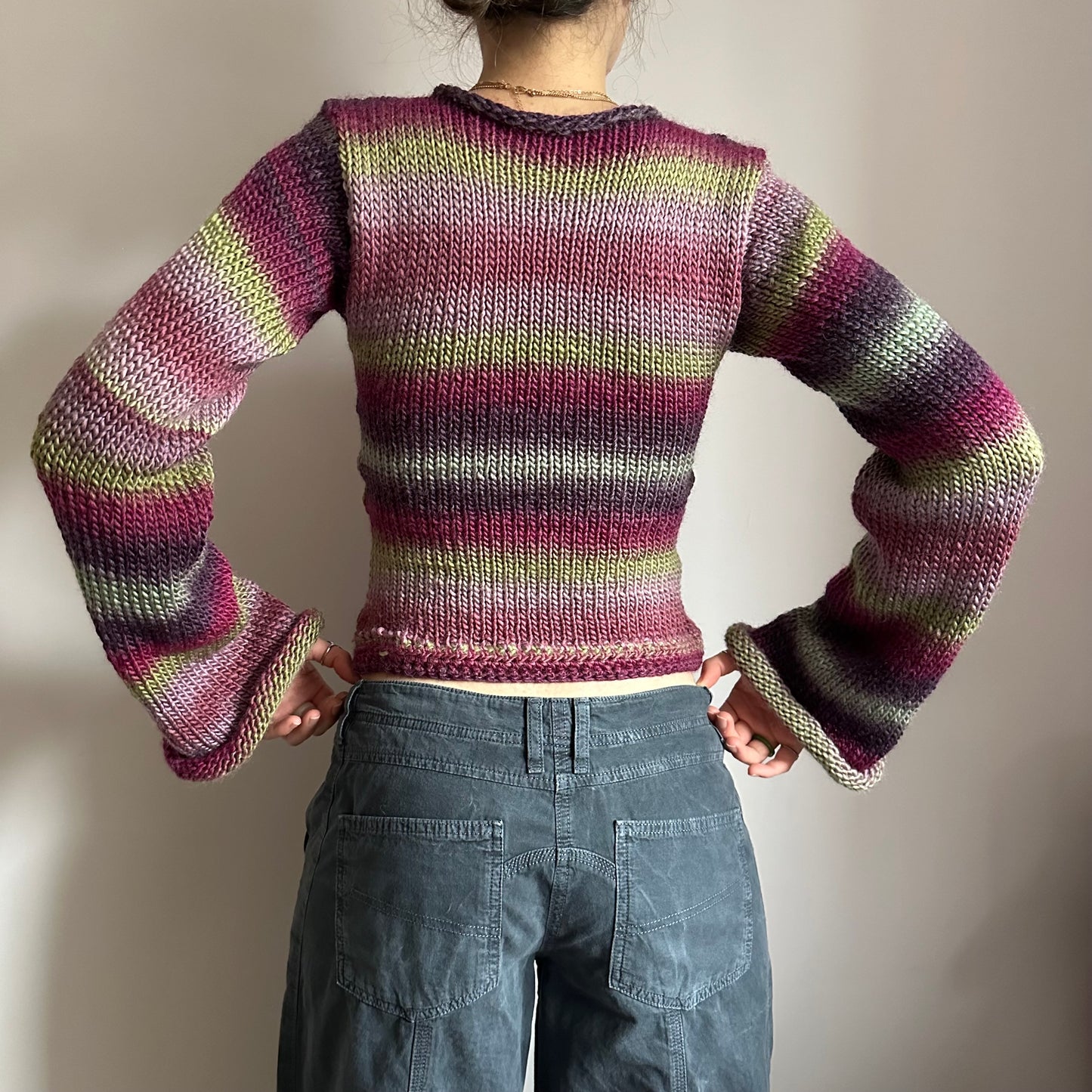 Handmade ombré knitted flared sleeve jumper in green and purple shades
