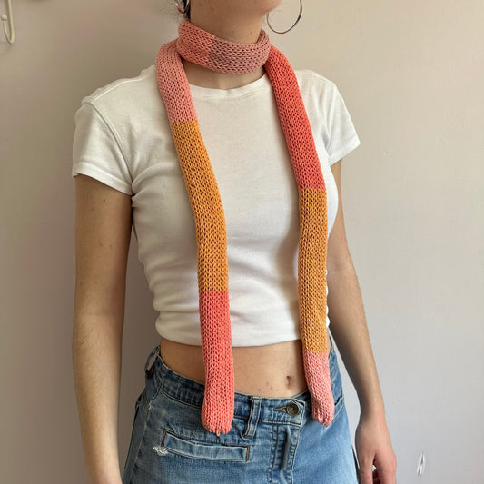 Handmade cotton knitted colour block skinny scarf in coral and orange